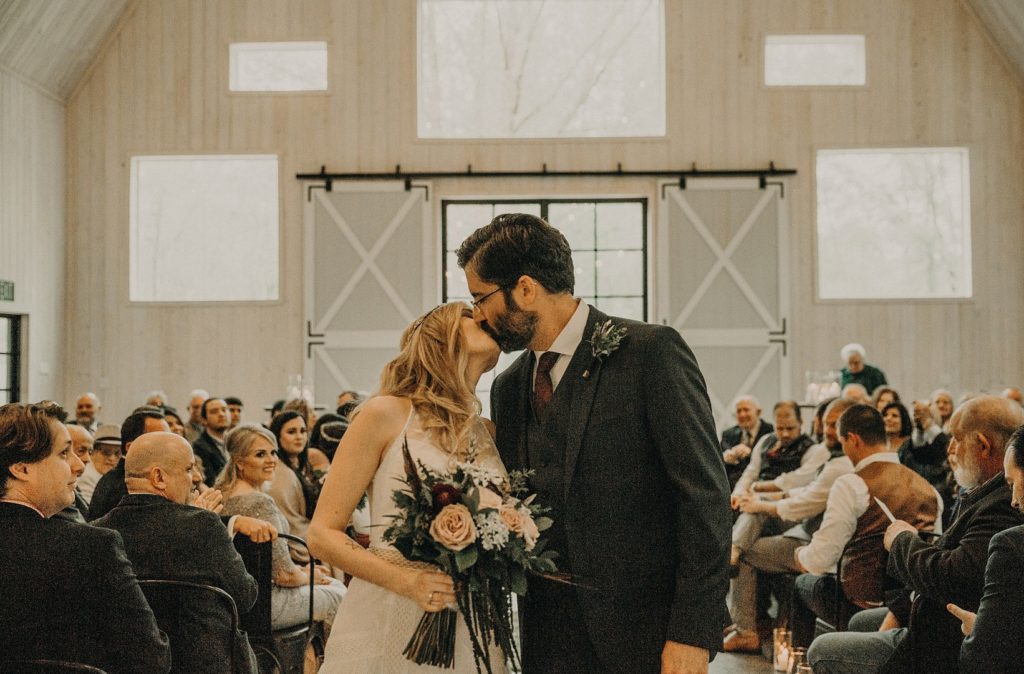 Bride and Groom at vintage barn wedding