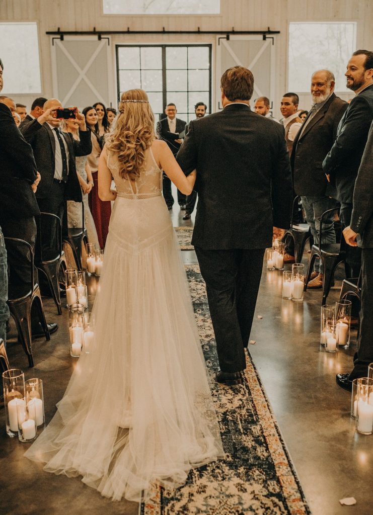 Bride Walking Down Aisle Vintage Barn Wedding