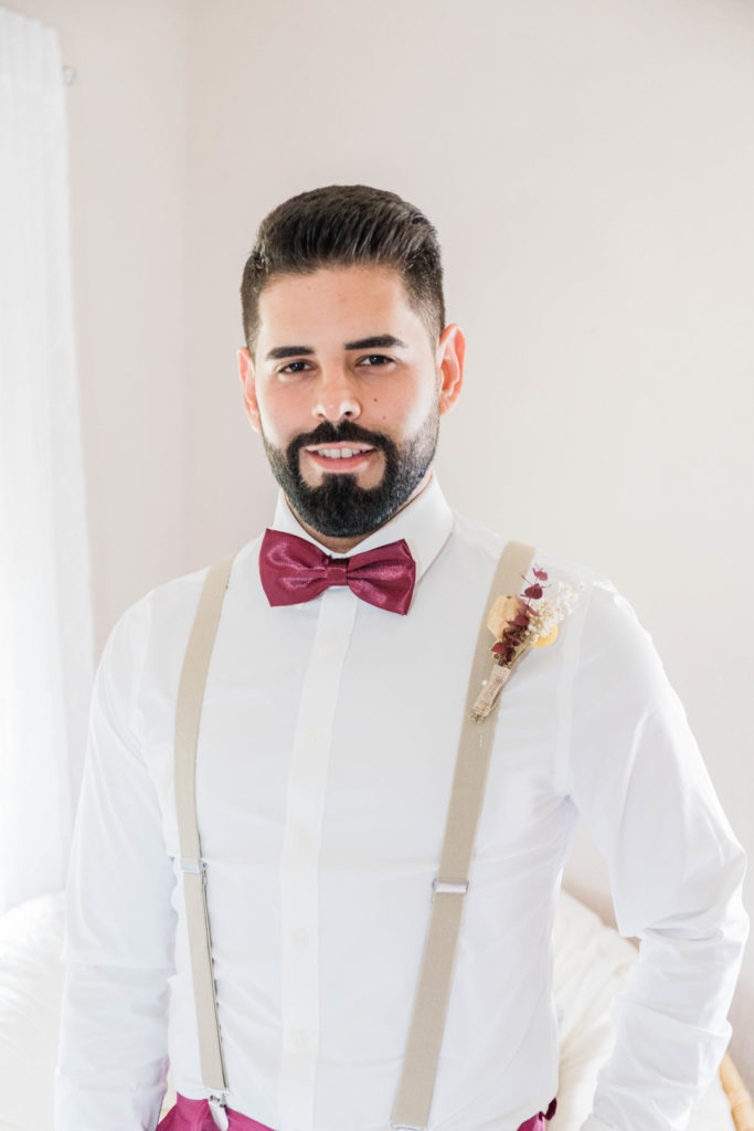 Bright Rustic Wedding | Groom Suspenders
