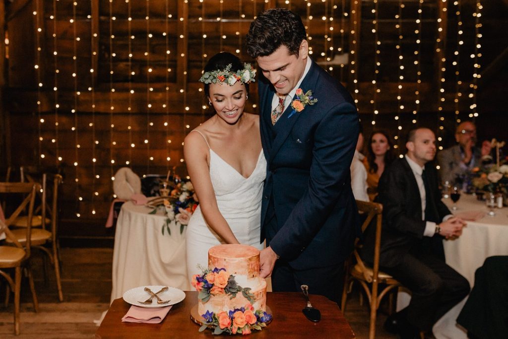 Cutting the Cake | Rustic Barn Wedding