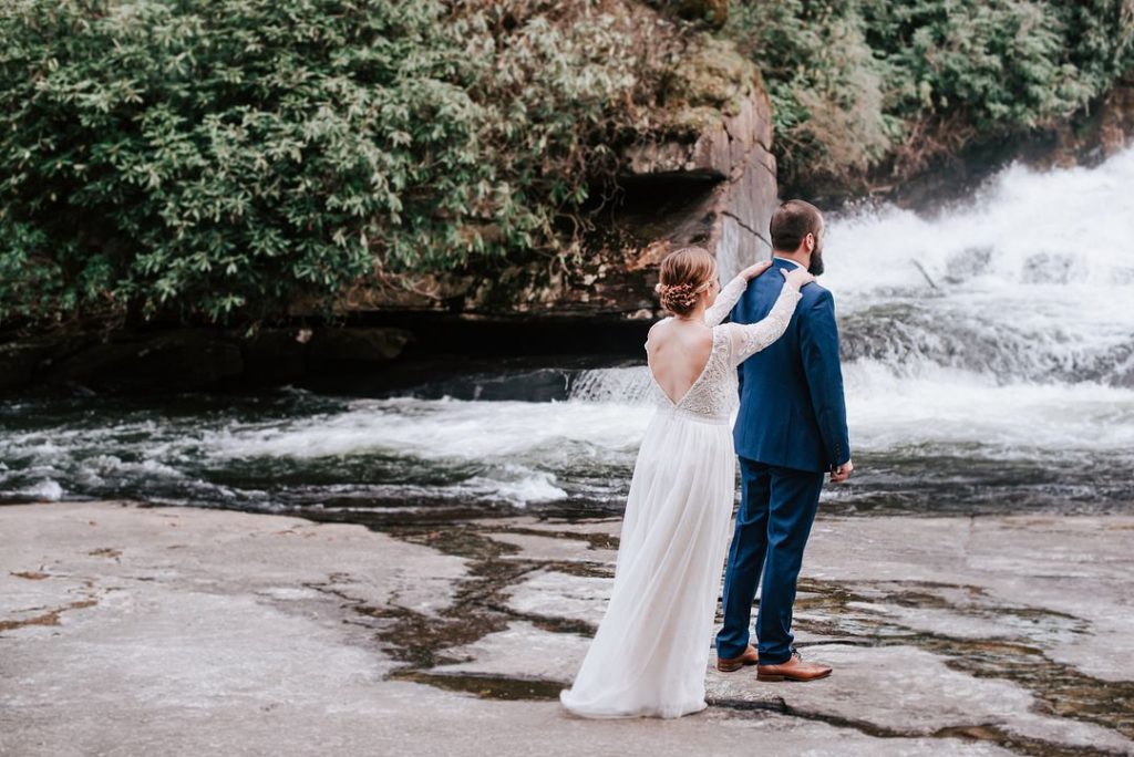 First Look Woodsy Waterfall Wedding