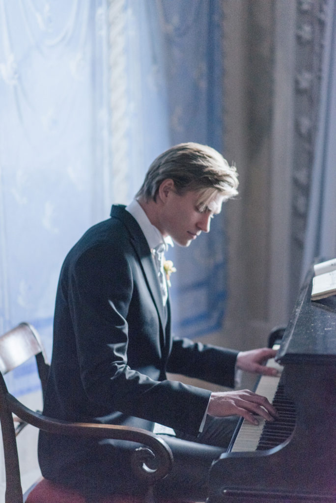 Groom Playing Piano | Tuscan Wedding