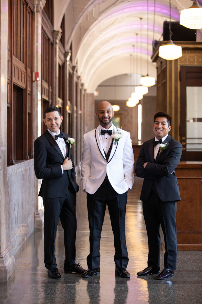 White Tux Groom + Groomsmen